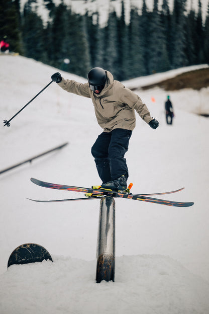 Skier on Rail doing a front swap